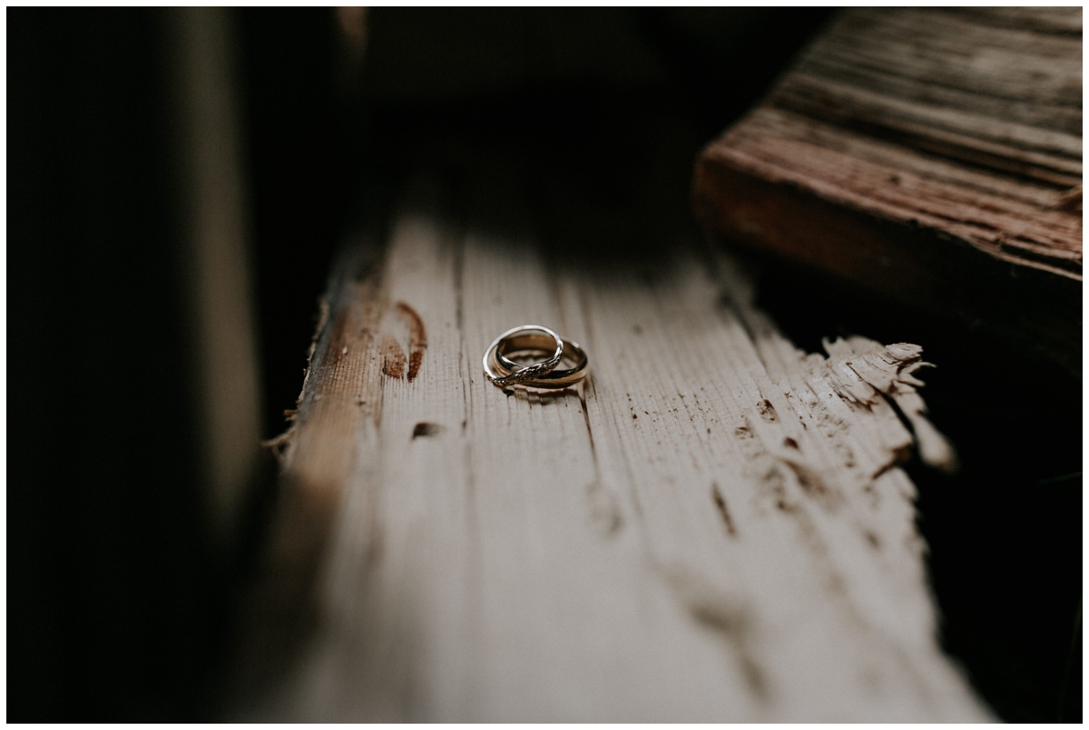 wedding rings on chopped wood